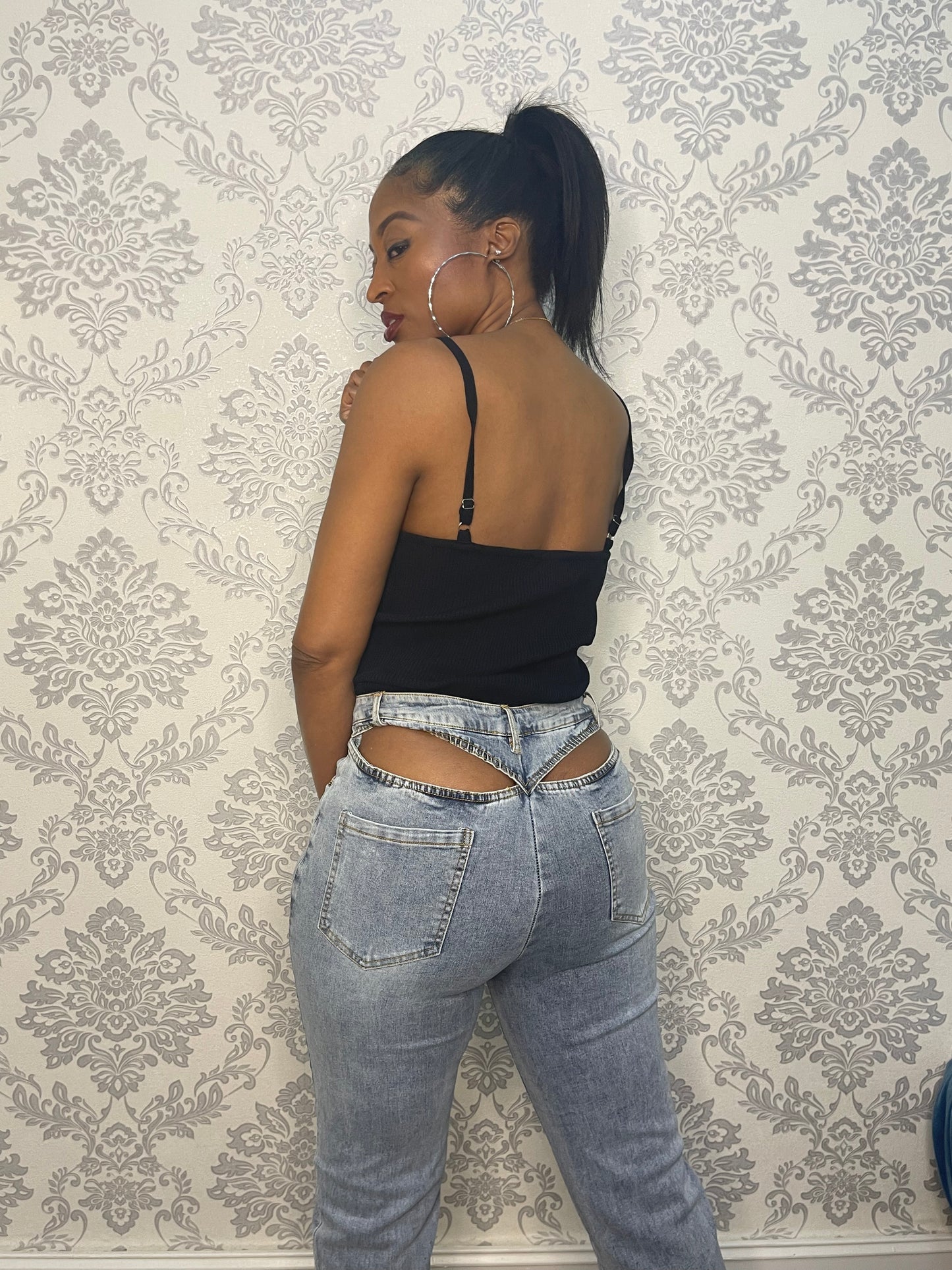 "CUT OUTS" HIGH RISE JEANS